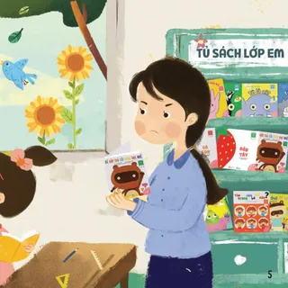 Cô bé buồn bã nhìn sách trong lớp