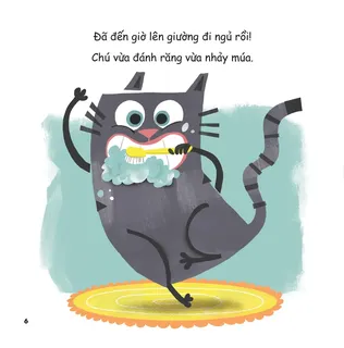 Mèo con vui vẻ đánh răng trước khi ngủ