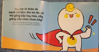 Miu bé nhỏ gồng bắp tay như siêu nhân